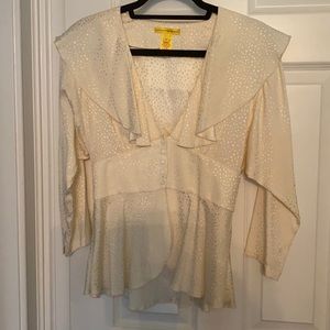 Beautiful ruffled cream blouse.